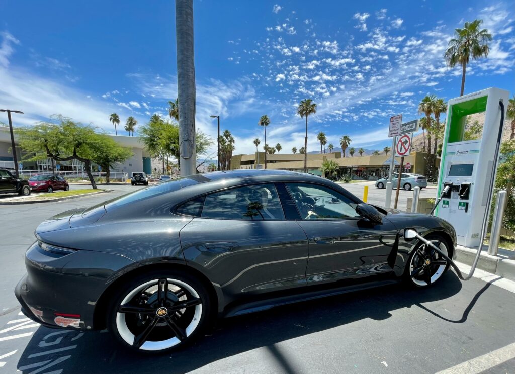 Modern electric car charging at a station representing auto category"