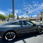 Modern electric car charging at a station representing auto category"